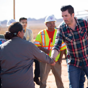Property Brothers star Jonathan Scott meet Navajo Tribal Utility Authority employees at Kayenta II solar facility.