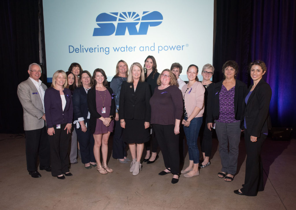Leaders of SRP's Women's Interest Network pose for a photo with Justice Timmer at the event.