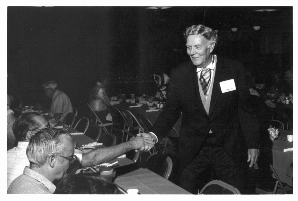 Karl Abel pictured shaking hands with SRP employees.