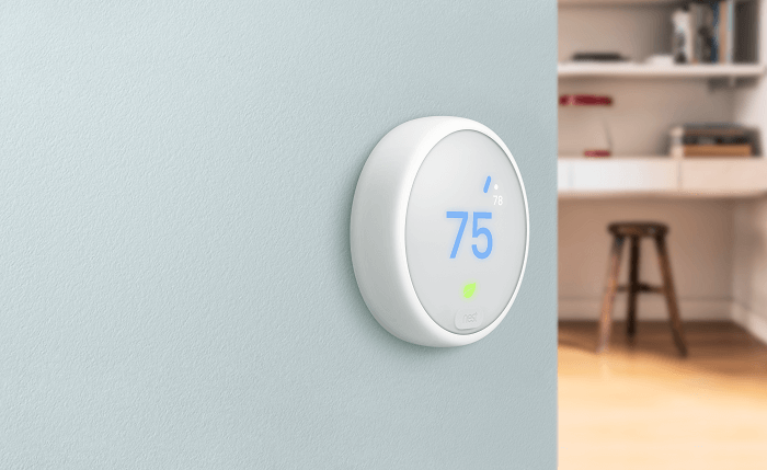 Photo of a Nest thermostat in a home