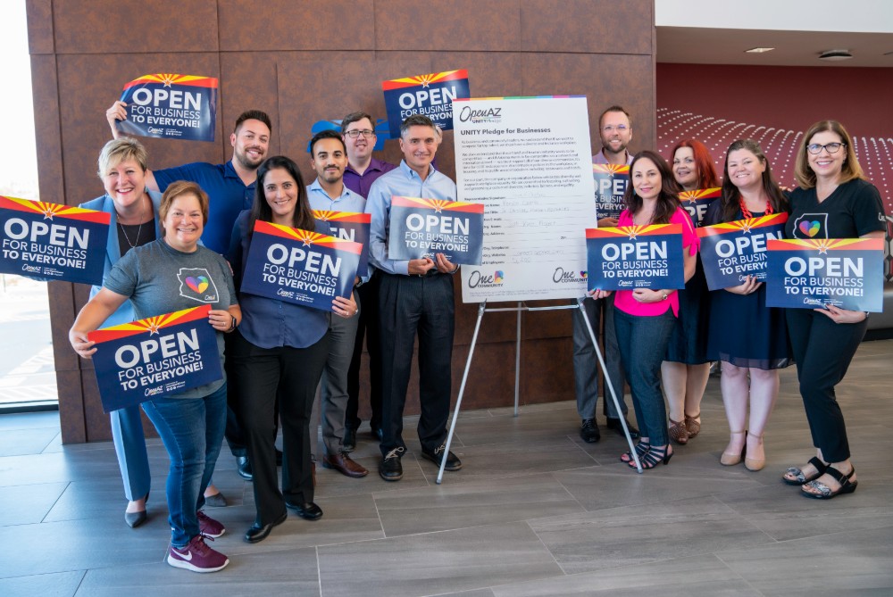 Photo of SRP employees celebrating the signing of the #OpenAZ UNITY Pledge.